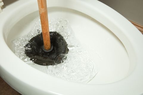 plunger-working-on-toilet-clog-royalty-free-image-185122993-1540318418jpg
